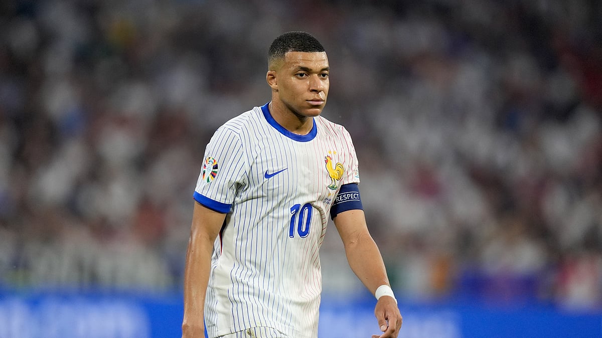 (AP Photo/Matthias Schrader)

 : Kylian Mbappe of France walks on the pitch during a semifinal match between Spain and France at the Euro 2024 soccer tournament in Munich, Germany, Tuesday, July 9, 2024. 
